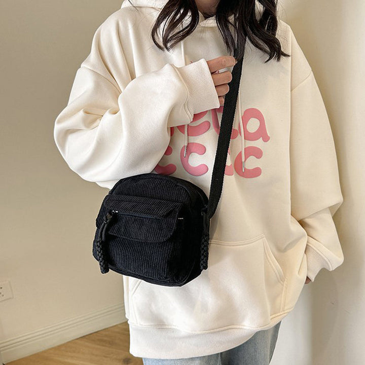 Textured small crossbody bag, a perfect everyday accessory for women.
