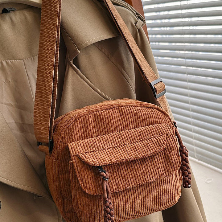 Compact and functional women's crossbody bag, ideal for fashion accessories.