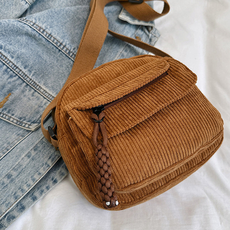 Chic small crossbody bag with a modern textured design for women.