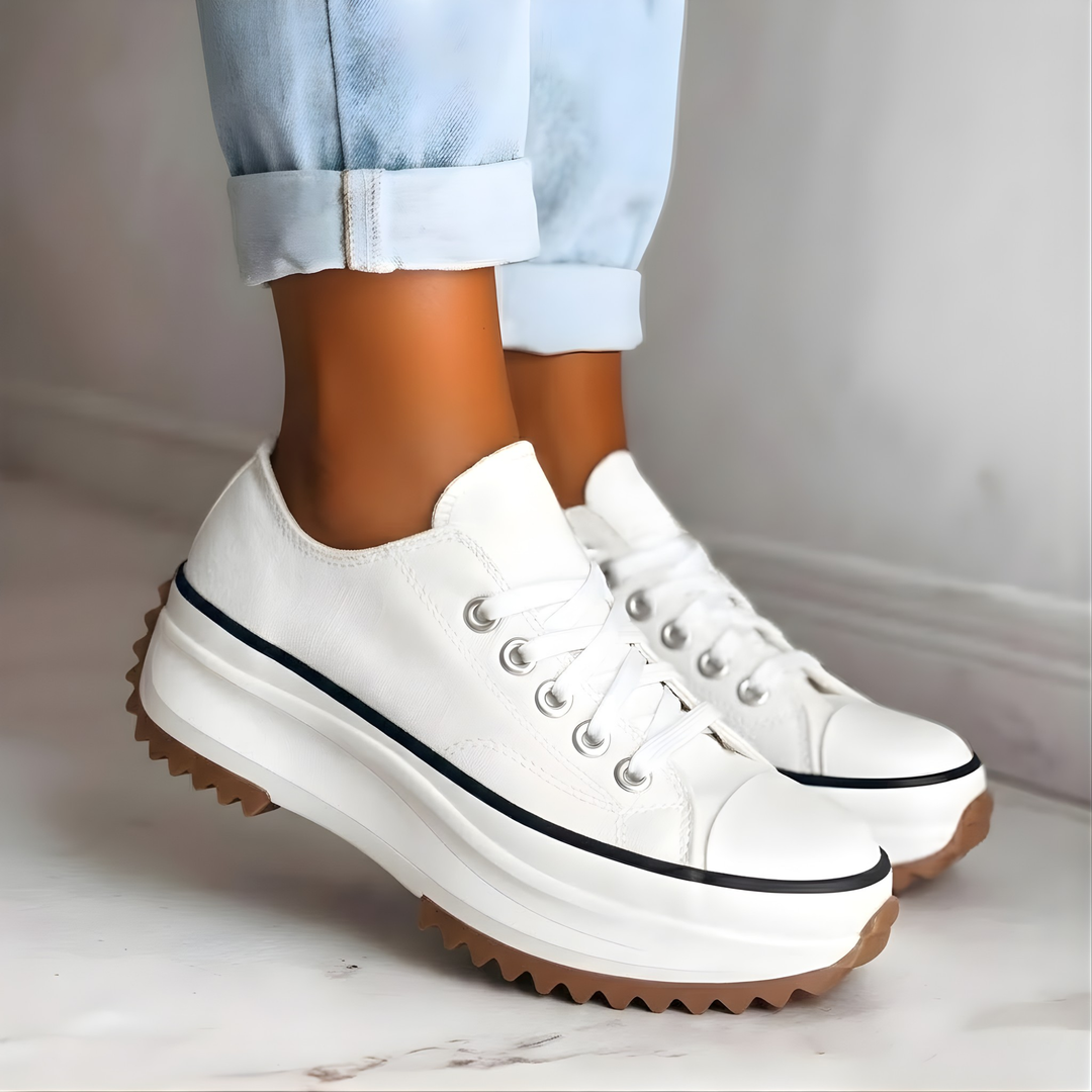 Supportive women's orthopedic sneakers with arch support, designed for all-day comfort & walking.
