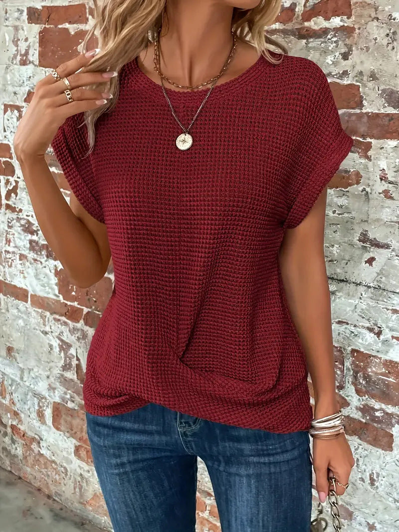 Textured waffle knit women's top, a breathable and soft casual shirt for relaxed everyday wear.