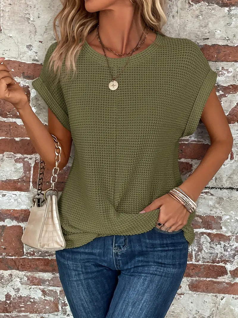 Comfortable women's waffle knit casual top with a stylish textured design, ideal for everyday fashion.