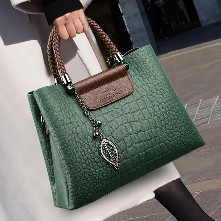 Close-up of the Women's Sophia classic handbag, showcasing premium green leather texture.