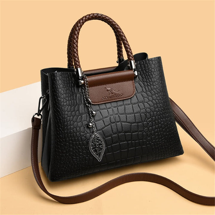 Elegant Sophia classic handbag in green leather, a must-have women's fashion accessory.
