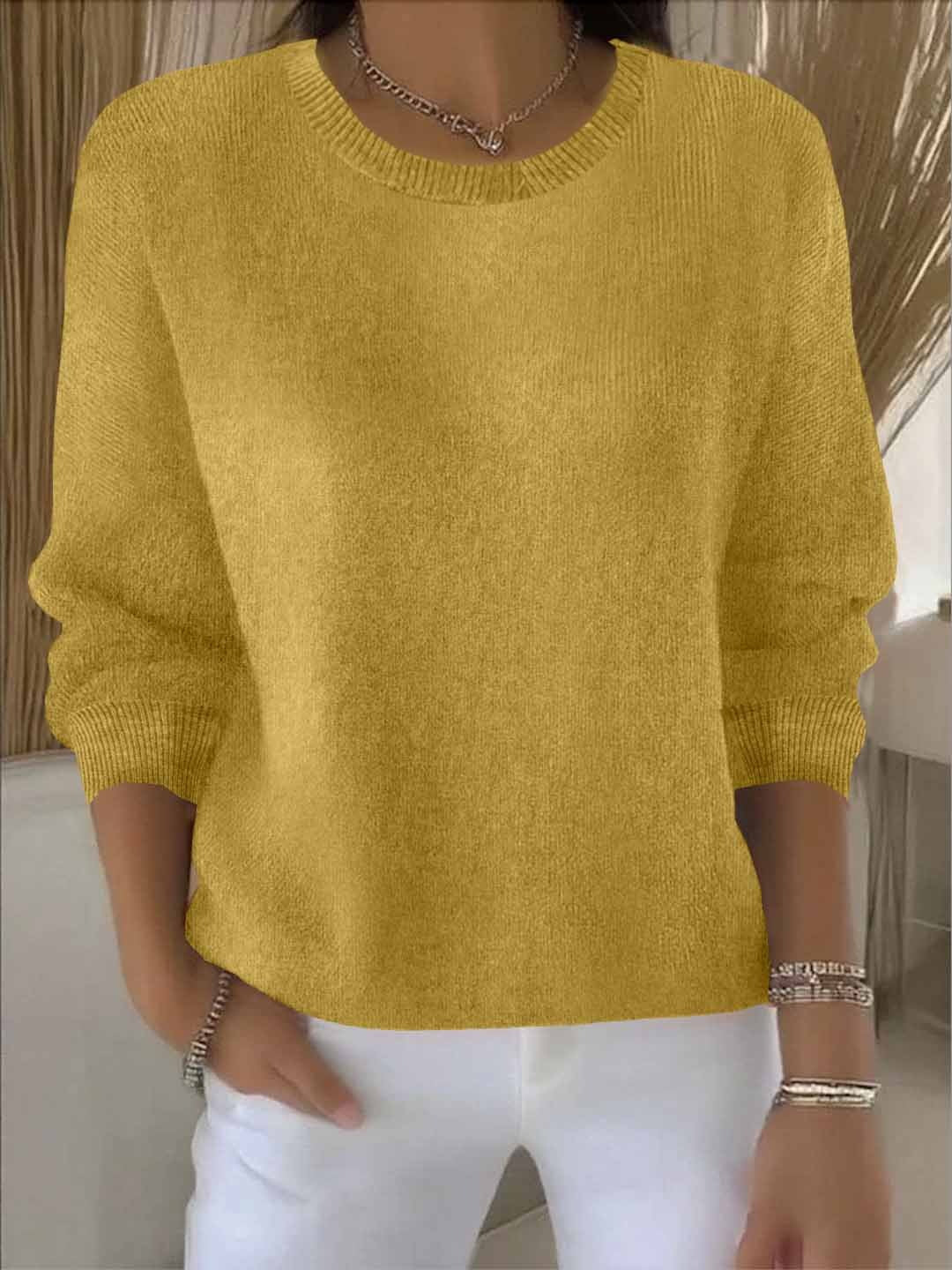 Women's sophisticated V-neck sweater in classic black, a versatile wardrobe essential.