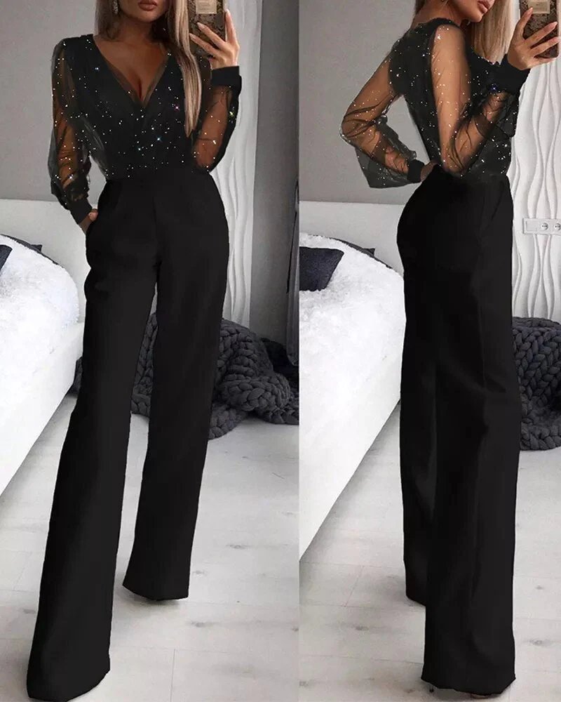 Women's sparkling black glitter jumpsuit 'Aurora' for stylish party wear and special occasions.