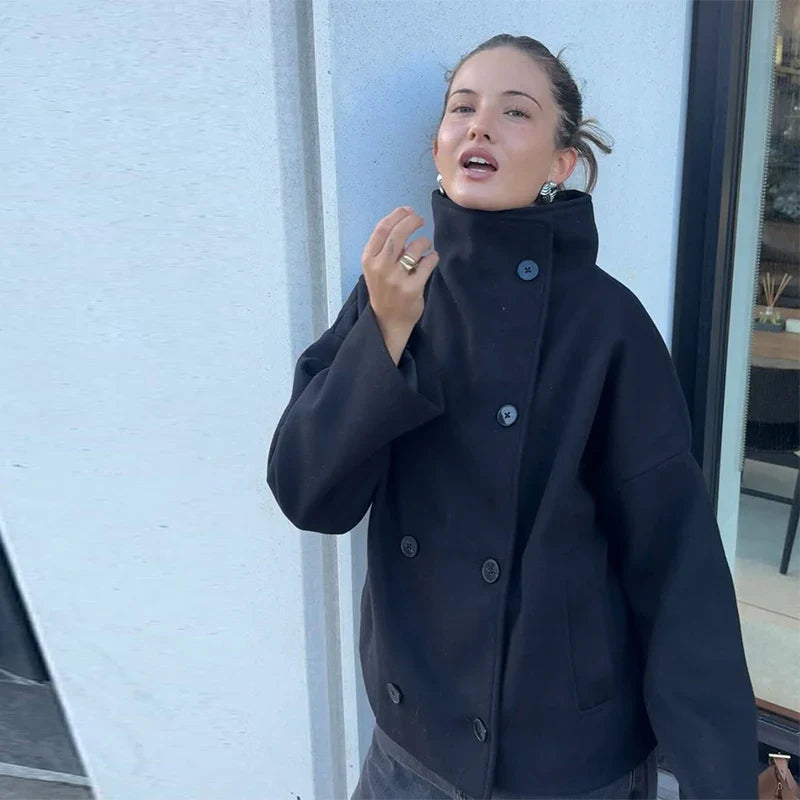 Sophisticated outerwear: women's elegant pea coat with a defined stand collar.