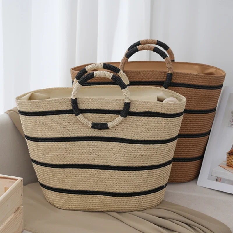Chic women's striped tote bag with woven handles, a versatile summer accessory for beach trips, shopping, or everyday style.
