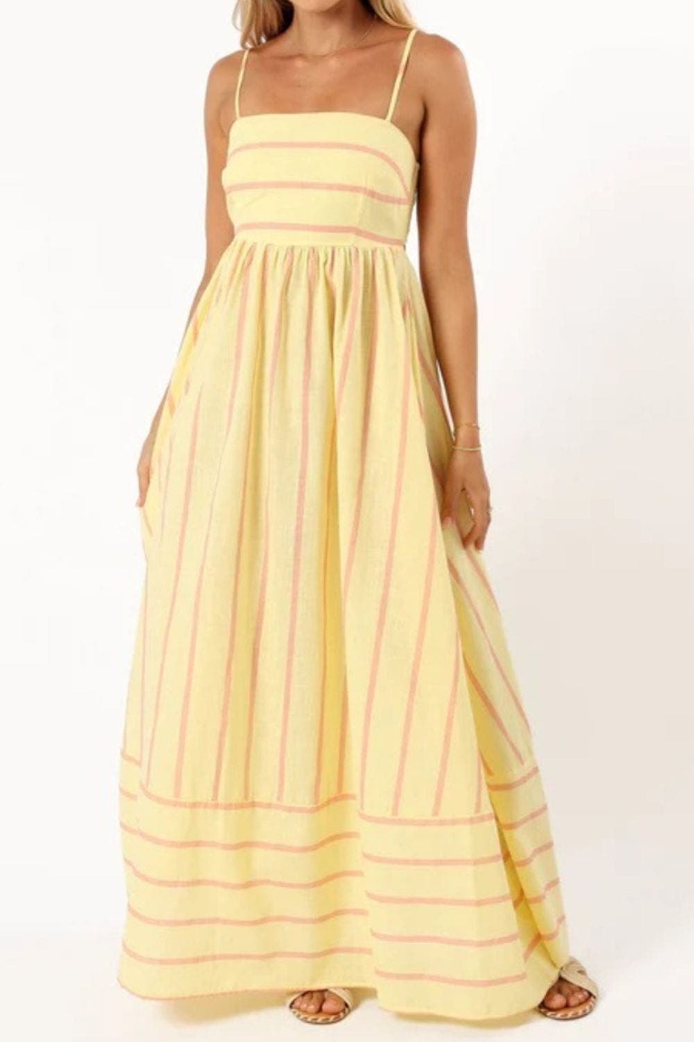 Stylish women's striped maxi dress, ideal strappy summer beach or resort wear.