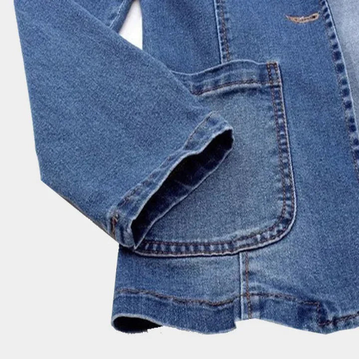 Full shot of a woman wearing a versatile blue denim blazer, ideal for stylish everyday outfits