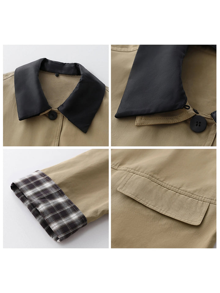 Women's elegant button-up jacket featuring contrast trim and subtle plaid details. Perfect fall layering.
