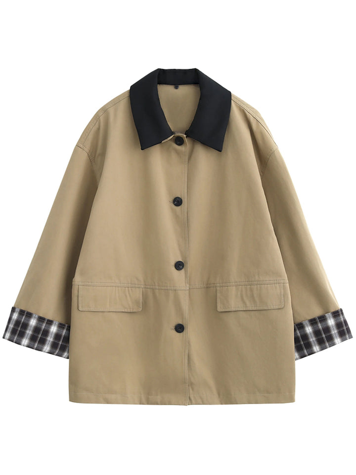 Chic women's button-up jacket with stylish contrast trim. A versatile layering piece for casual & everyday wear.