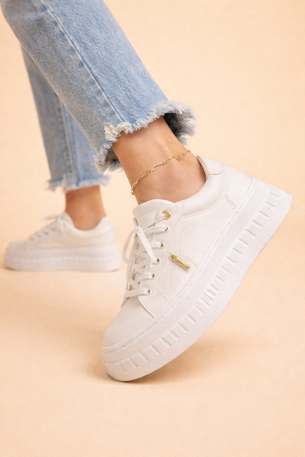 Close-up of women's stylish plateau sneakers, highlighting comfort and design.