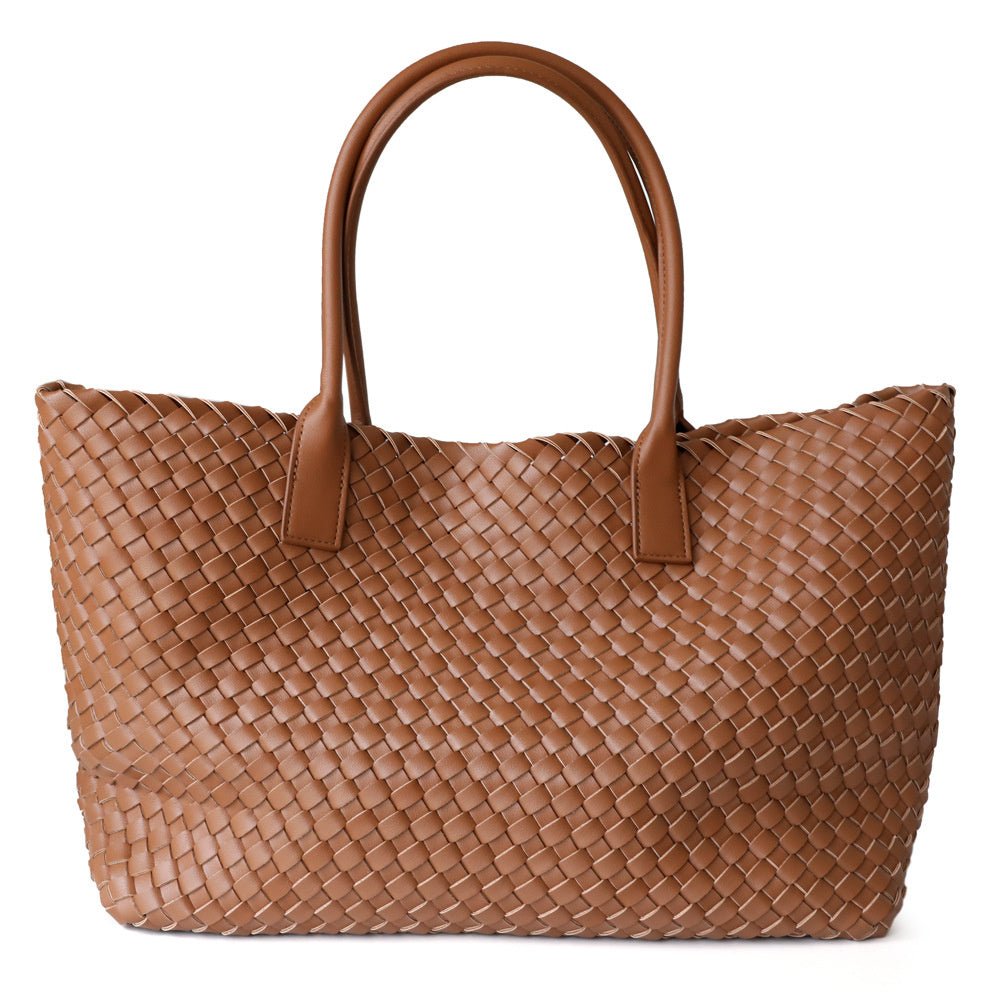 Handcrafted woven leather shoulder bag for women. Elegant, durable, and spacious everyday tote.