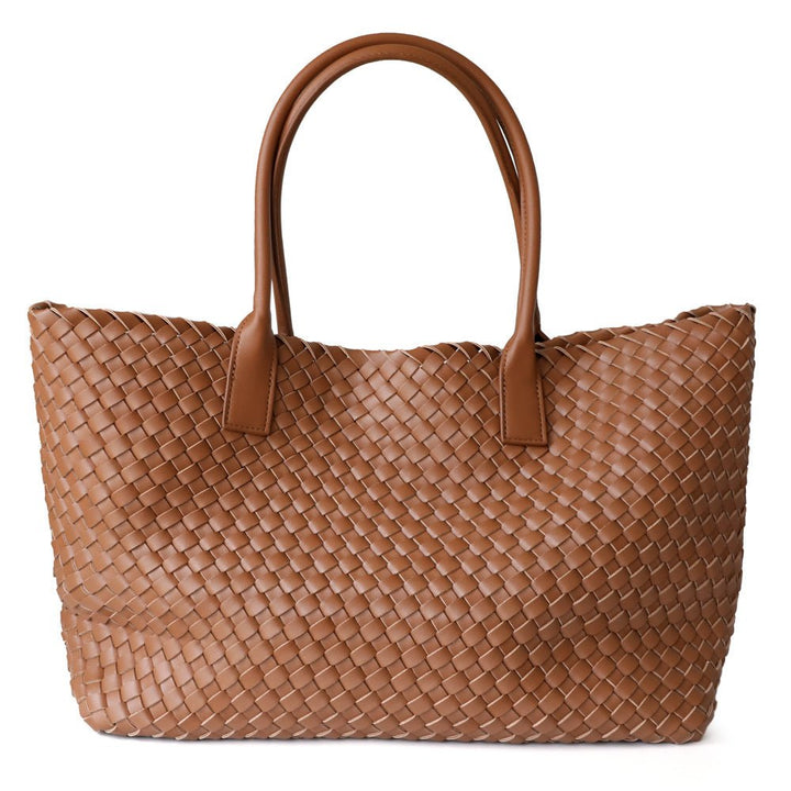Handcrafted woven leather shoulder bag for women. Elegant, durable, and spacious everyday tote.