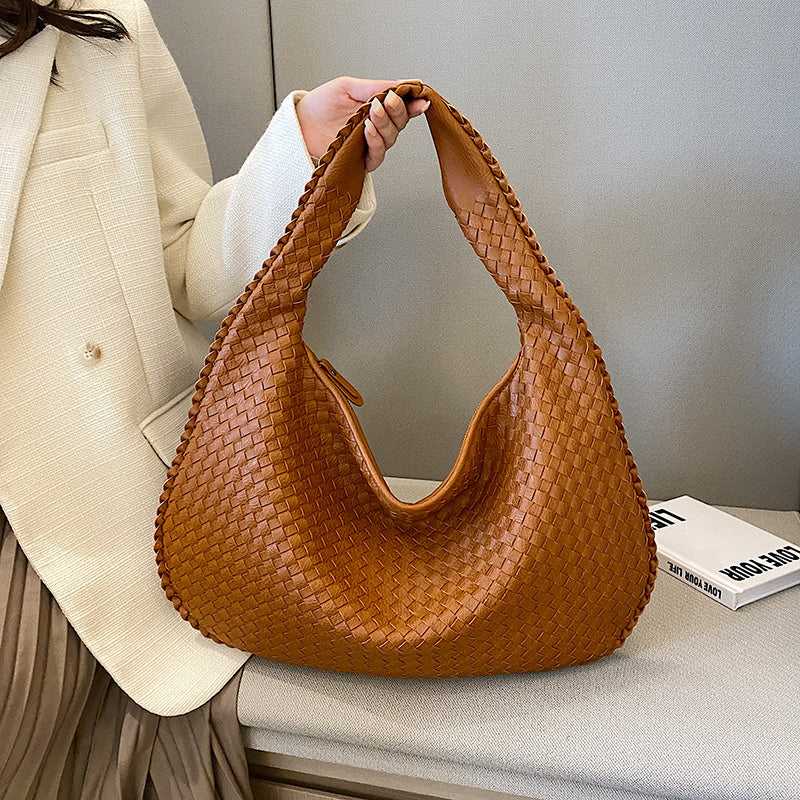 Women's stylish woven shoulder bag, perfect for work & everyday use. A versatile fashion accessory.