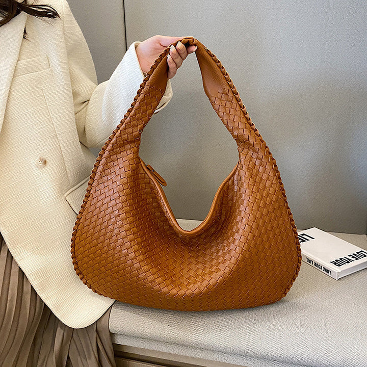 Women's stylish woven shoulder bag, perfect for work & everyday use. A versatile fashion accessory.