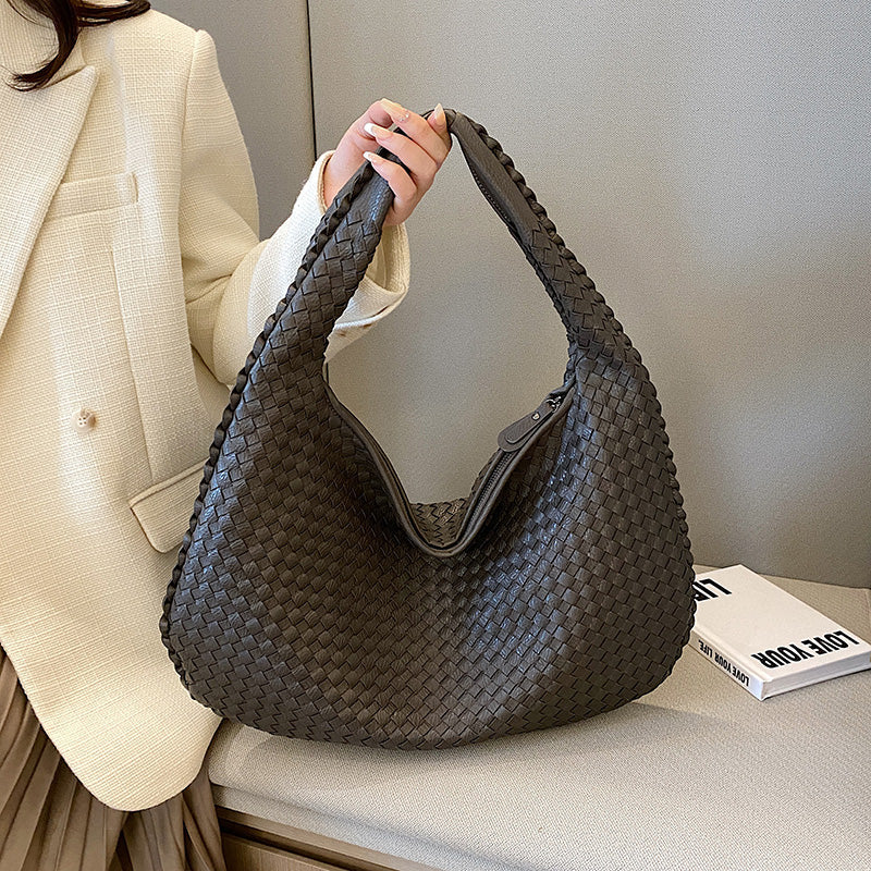 Chic woven women's shoulder bag, a practical & stylish accessory for work, travel, or daily wear.
