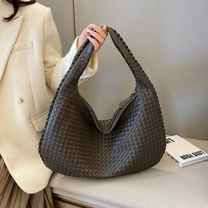 Chic woven women's shoulder bag, a practical & stylish accessory for work, travel, or daily wear.
