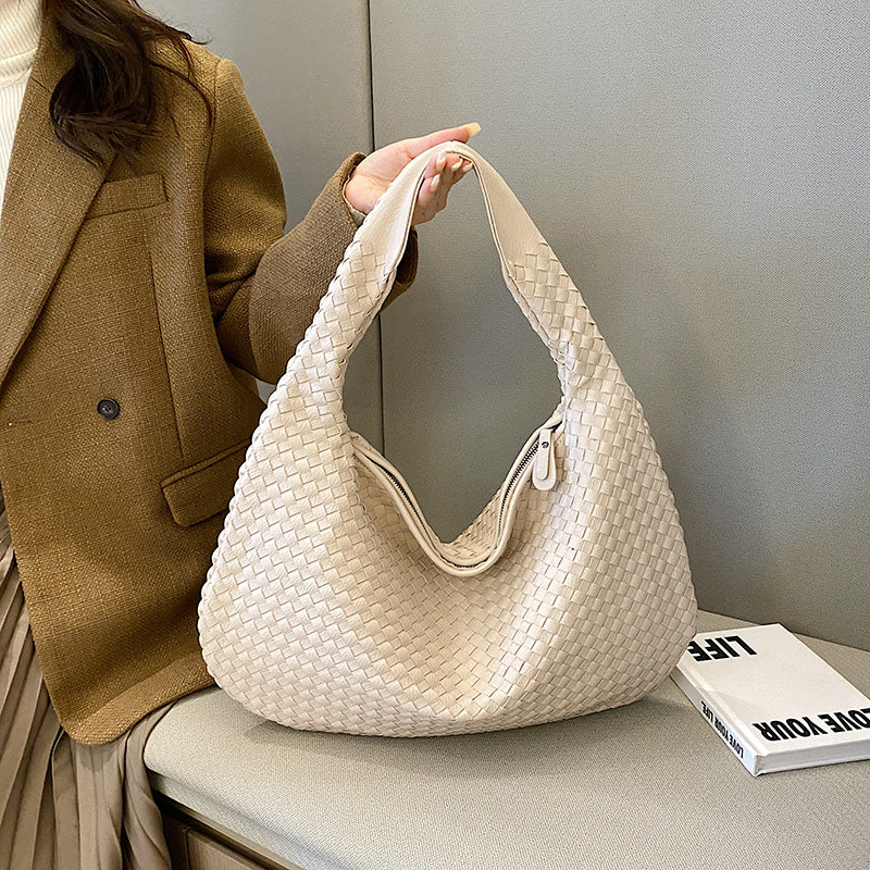 Comfortable & chic woven shoulder bag, an everyday women's handbag offering both style & practicality.