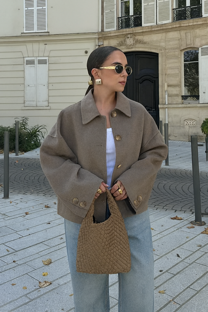 Oversized fit cream wool blend cropped jacket for women. Stylish winter fashion.