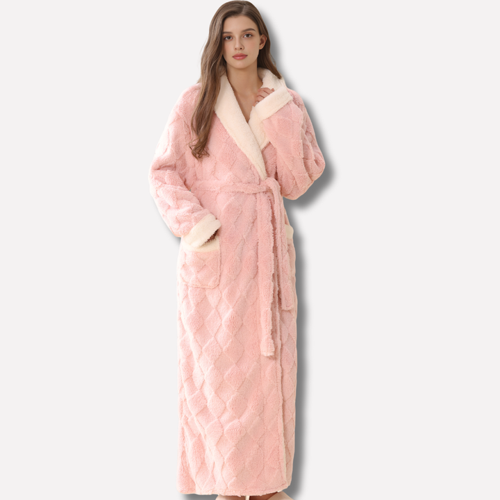 Women's thick hooded flannel bathrobe in plush coral fleece for ultimate winter warmth.