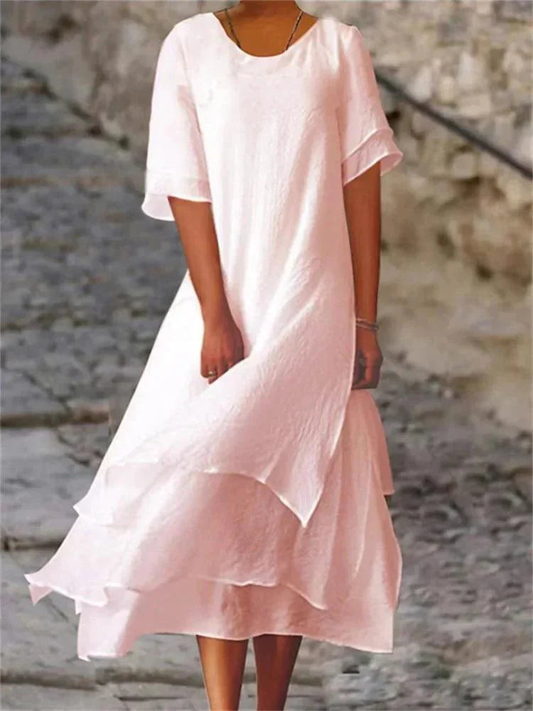 Women's tiered A-line midi dress, elegant & flattering with short sleeves, perfect for summer casual wear.