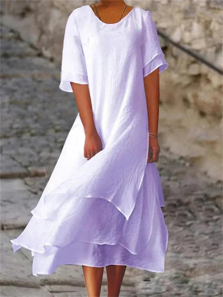 Flattering women's tiered A-line midi dress, features a round neck and short sleeves for an elegant, flowy look.