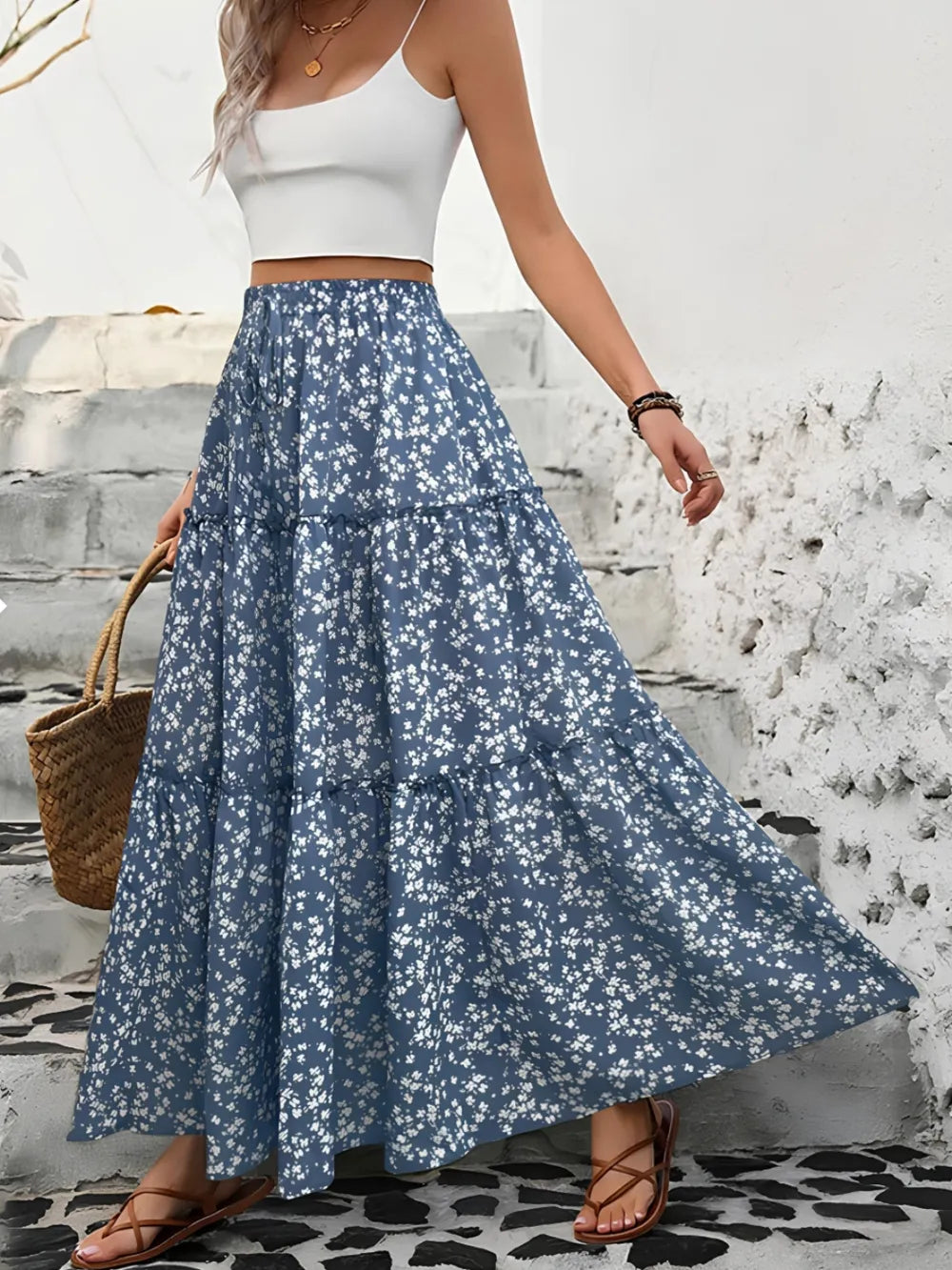 Women's tiered floral maxi skirt for summer, showcasing a boho and flowy style.