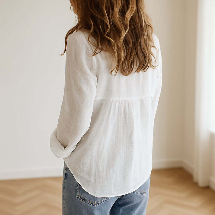Comfortable women's long sleeve button-down shirt in white, perfect for spring/summer fashion & everyday style.