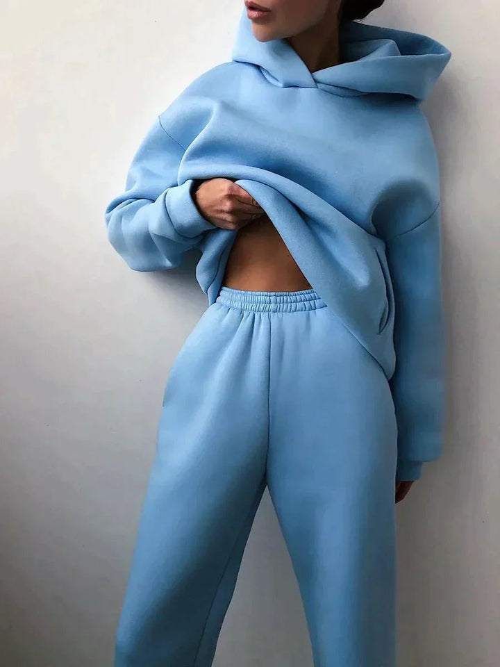 Women's two-piece jogging set with a comfortable hoodie and matching sweatpants.