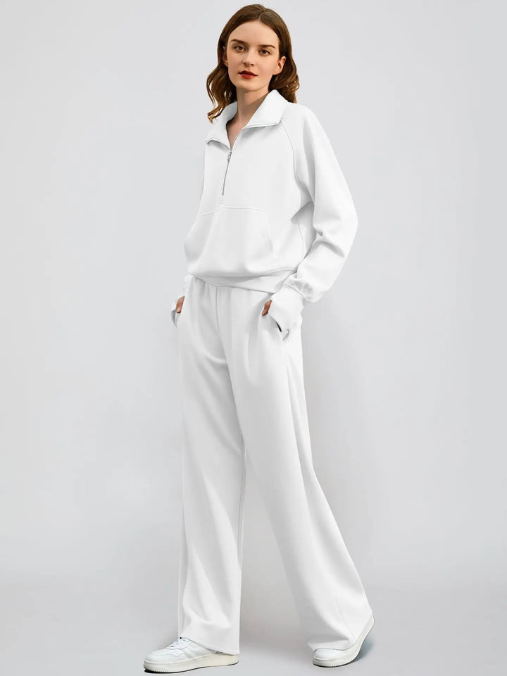Fashionable two-piece outfit for women: long-sleeved half zip top and matching wide-leg lounge pants.
