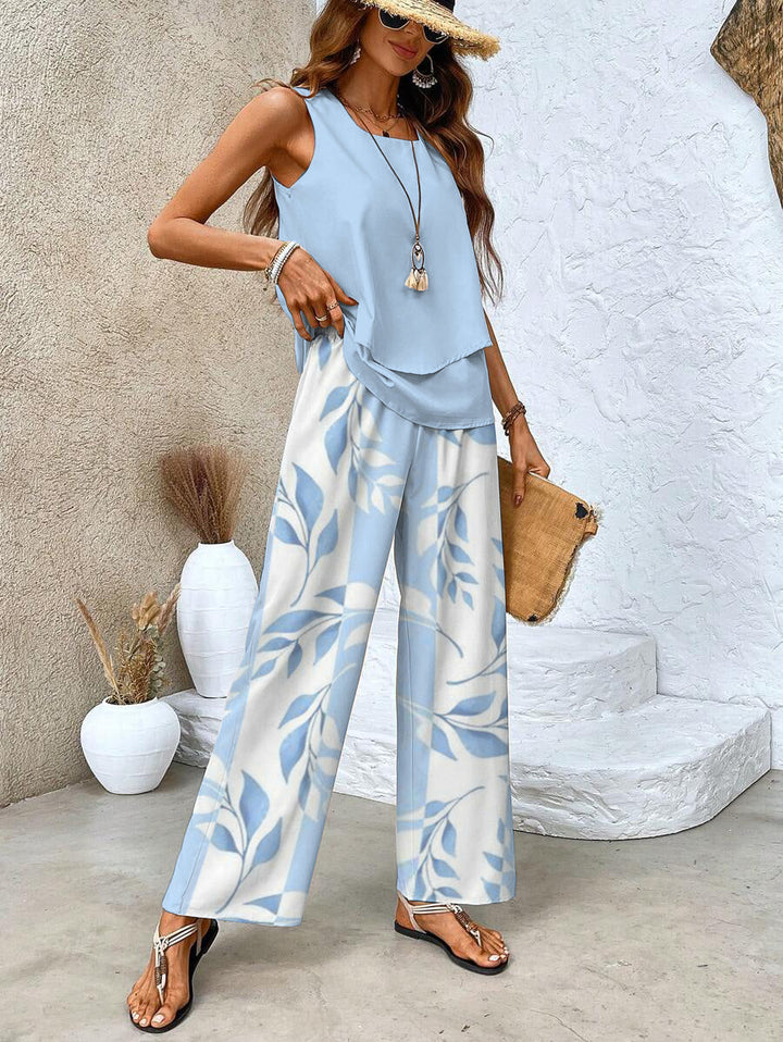 Stylish women's summer set: a comfortable breezy top and fashionable wide-leg pants with a botanical design.