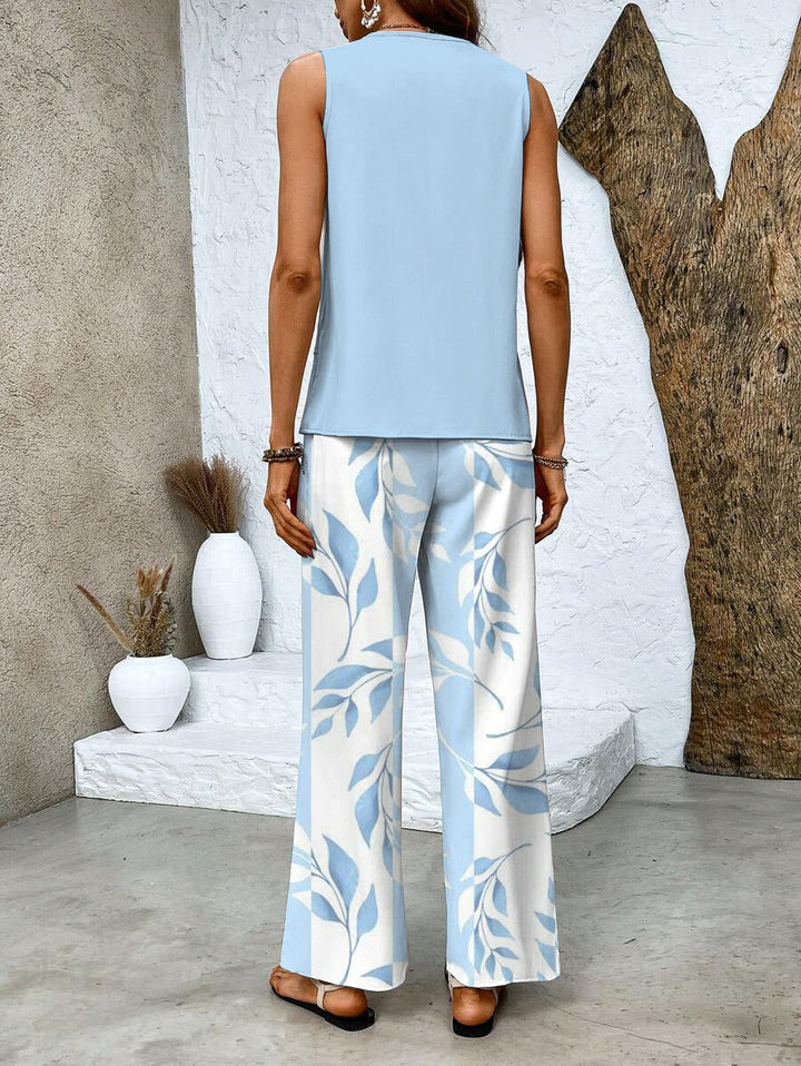 Lightweight women's two-piece set, ideal for summer. Includes a flowy top & wide-leg pants for easy wear.