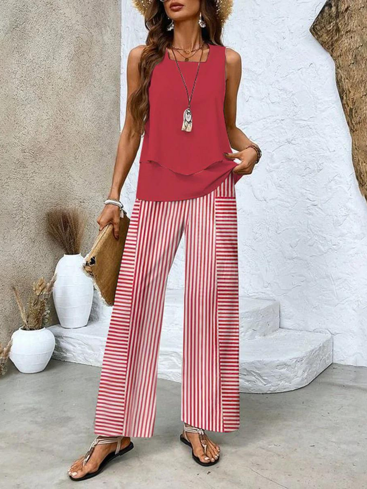 Casual women's fashion set: a sleeveless breezy top paired with comfortable wide-leg botanical pants for summer.
