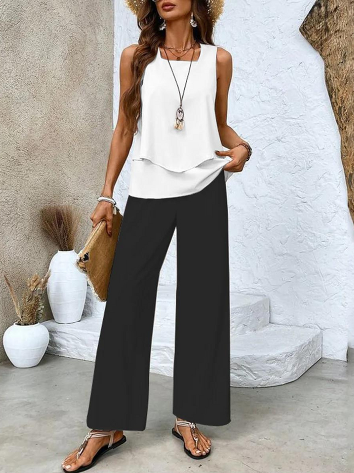 Versatile women's two-piece summer outfit with a breezy top and flowy wide-leg pants for effortless style.