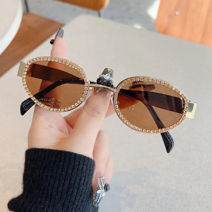 Close-up of fashionable women's round sunglasses featuring a durable metal frame.