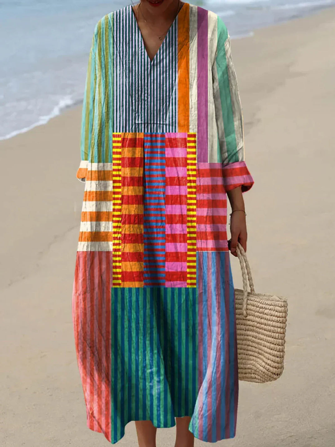 Women's vibrant multicolor flowing maxi dress, ideal for summer, vacation, or bohemian style.