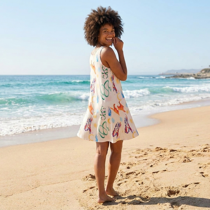 Flowy multicolor printed women's midi dress, sleeveless square neck. Ideal beachwear and casual summer vacation outfit.
