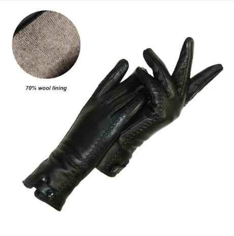 Warm women's leather gloves, wool lined for winter. Stylish vintage design, perfect ladies fashion accessory.