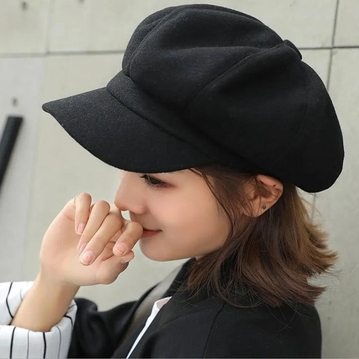 Women's vintage cotton balloon hat, warm and stylish retro fashion accessory for winter.