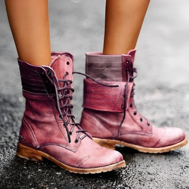 Women's vintage lace-up combat ankle boots. Rugged yet stylish, perfect for casual chic outfits.
