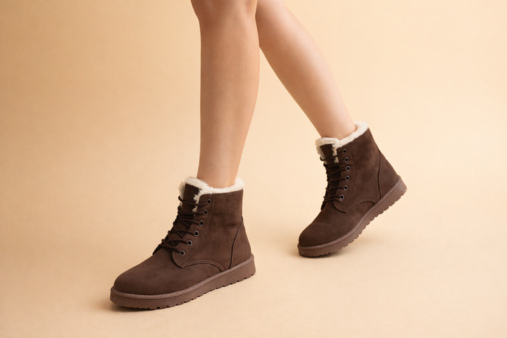 Durable outdoor women's boots designed for warmth and comfortable trekking.