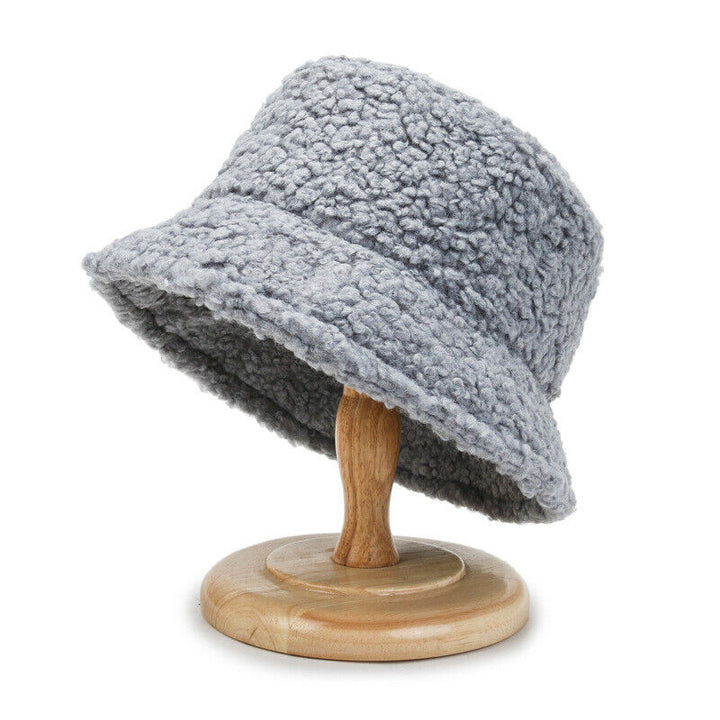 Plush teddy bucket hat for women, offering ultimate warmth and style for cold weather. A must-have winter accessory.