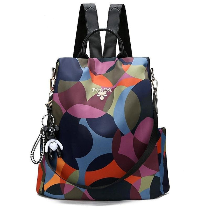 Women's water-resistant anti-theft backpack with hidden back access, perfect for daily carry & travel.