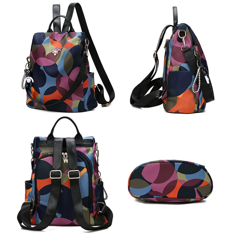 Stylish women's anti-theft backpack in oxford fabric, water-resistant for secure daily carry & travel.