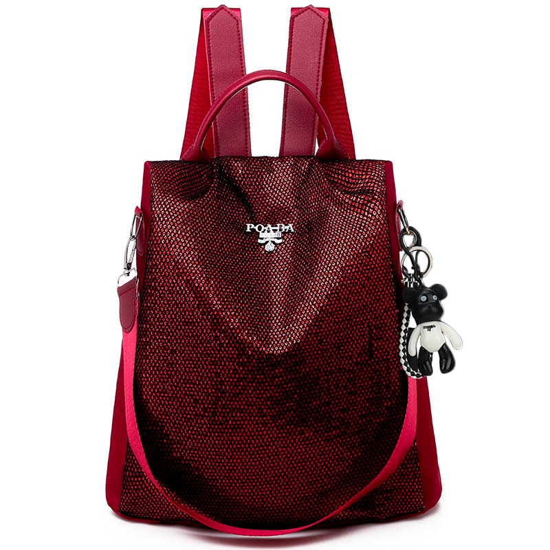 Multi-pocket women's anti-theft backpack, water-resistant oxford fabric, great for organized daily carry.