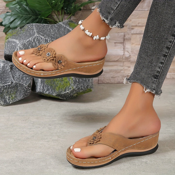 Women's comfortable wedge sandals with arch support. Perfect platform thong sandals for all-day summer wear.