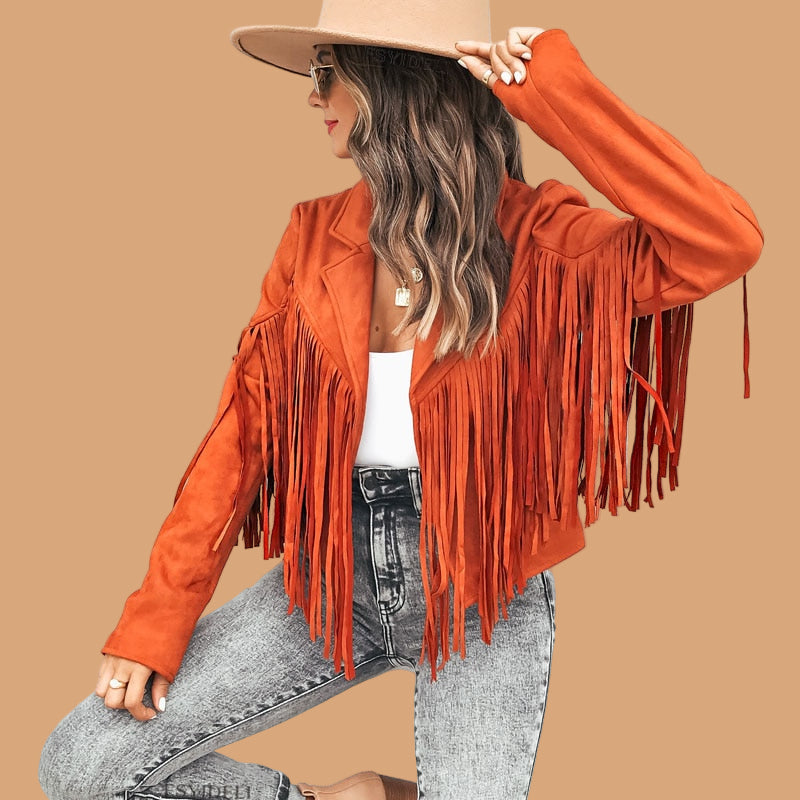 Model wearing a trendy women's statement jacket with bold western fringe
