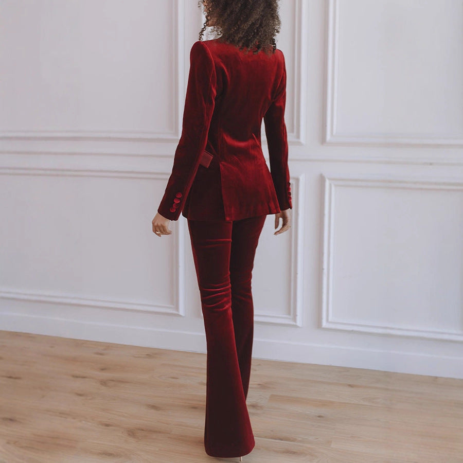 Professional women's matching blazer & flare trouser set. Elegant workwear for a stylish look.